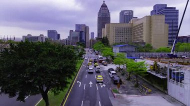 Tayvan 'da Taipei101 yakınlarında trafik sıkışıklığı. Yüksek kalite 4K görüntü. Taipei Tayvan 'ın Taipei ilçesi, Tayvan' ın Taipei şehrinin merkezidir..