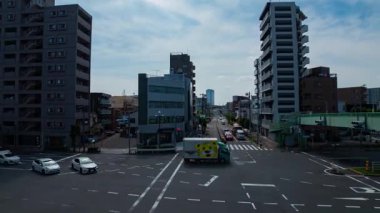 Tokyo 'daki şehir merkezinde trafik sıkışıklığı zamanı. Yüksek kalite 4K görüntü. Kita bölgesi Ouji Tokyo Japonya 07.18.2024 Tokyo şehir merkezinde bir caddedir.. 