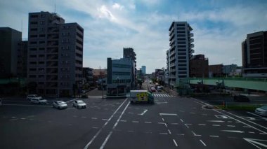 Tokyo 'daki şehir merkezinde trafik sıkışıklığı zamanı. Yüksek kalite 4K görüntü. Kita bölgesi Ouji Tokyo Japonya 07.18.2024 Tokyo şehir merkezinde bir caddedir.. 