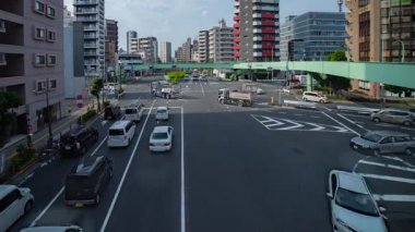 Tokyo 'daki şehir merkezinde trafik sıkışıklığı zamanı. Yüksek kalite 4K görüntü. Kita bölgesi Ouji Tokyo Japonya 07.18.2024 Tokyo şehir merkezinde bir caddedir.. 