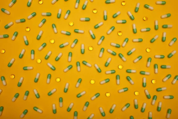 Gefüllter Hintergrund Grün Gelber Kapseln Die Sich Getrennt Voneinander Befinden — Stockfoto
