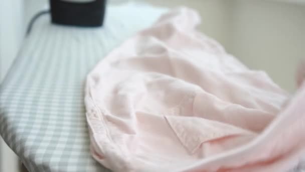 Woman Spraying Water Ironing Light Pink Trousers Ironing Board Hot — Stock Video