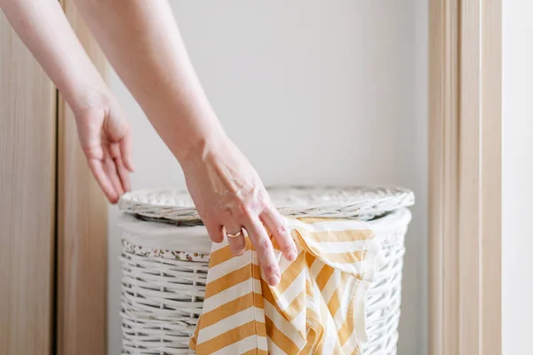 Female Hand Put Long Sleeved Shirt Laundry Basket High Quality — Stock Photo, Image