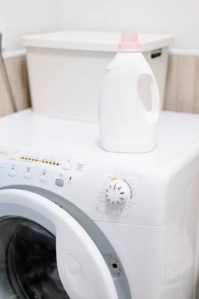 stock image Washing gel liquid laundry detergent and fabric softener on washing machine. High quality photo