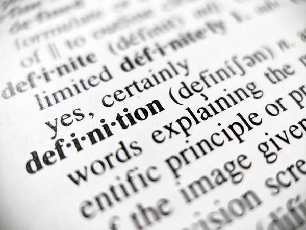Dictionary Definition Word Defined Paper Page Focus Blur Fotos de stock libres de derechos