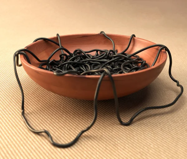 Desordenado Tazón Madera Espaguetis Sepia Negra Sobre Una Superficie Cálida — Foto de Stock
