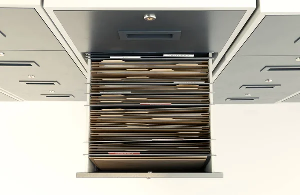 Closeup View Open Filing Cabinet Drawer Revealling Confidential Related Documents — Stock Photo, Image