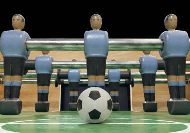 One side of a vintage foosball or table football table with worn metal figures styled in kit resembling the Uruguay national team - 3D render clipart