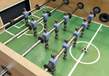 Uruguay milli takımını andıran giysili metal figürlerin olduğu klasik langırt ya da masa futbolu masasının bir tarafı - 3D