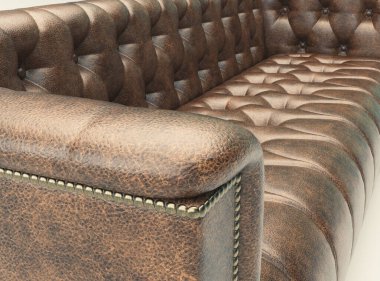 İzole edilmiş beyaz stüdyo arka planında uzun, lüks bir deri kanepe.