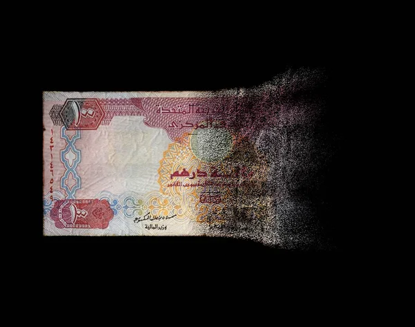 A concept image showing a half dissolved flat Dirham paper bank note on a dark studio background - 3D render