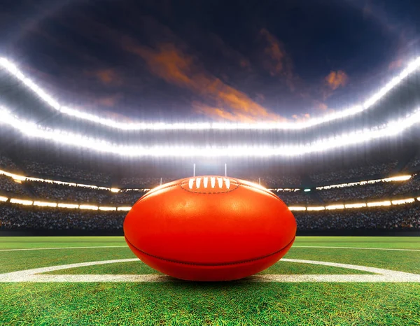 Красный Австралийский Мяч Правил Центральной Линии Стадиона Столбами Отмеченной Зеленой — стоковое фото