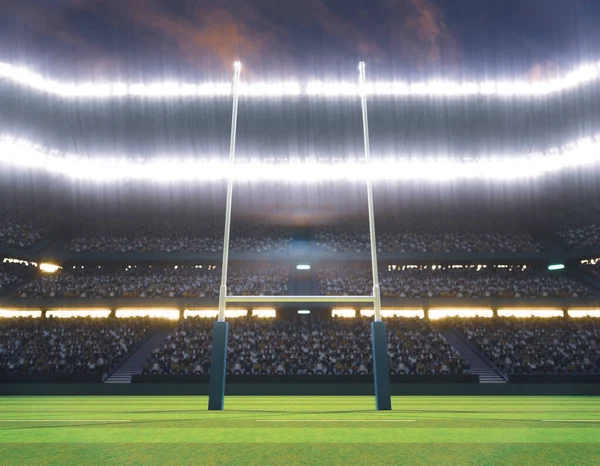 一个橄榄球体育场 夜间在灯火通明的泛光灯下 在绿色草坪上立柱 3D渲染 — 图库照片