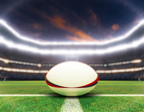 Мяч Регби Центральной Линии Регбийного Стадиона Столбами Обозначенной Зеленой Траве — стоковое фото