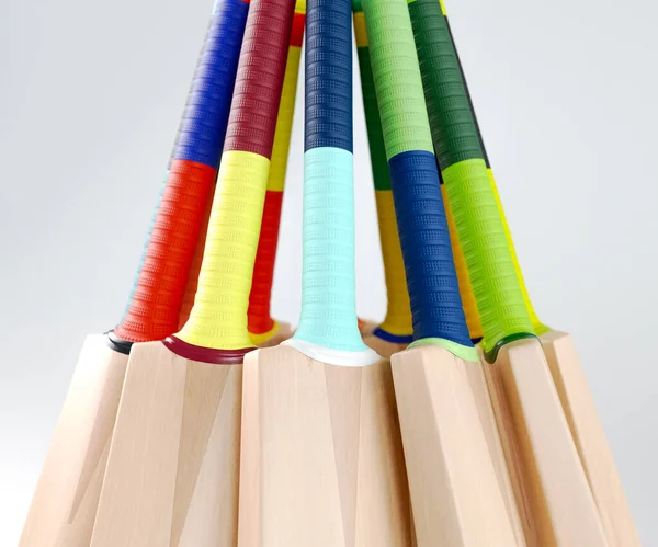 Een Cirkelvormige Opstelling Van Cricketvleermuizen Met Verschillende Kleurrijke Grepen Een — Stockfoto