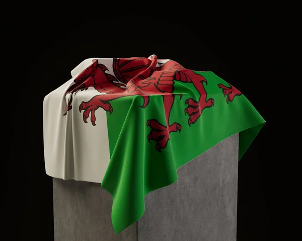 Een Wales Vlag Gedrapeerd Een Stenen Sokkel Een Geïsoleerde Donkere — Stockfoto