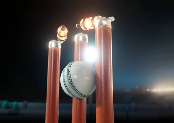 A white cricket ball striking orange electronic cricket wickets with dislodging bails and illuminating LED lights on a night sky background - 3D render