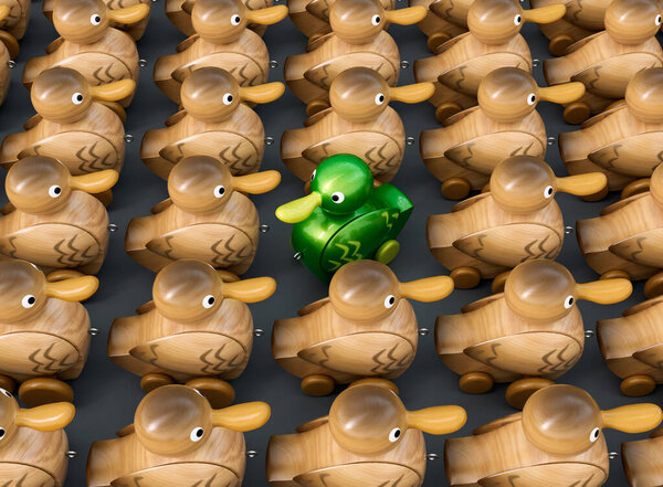 A non-conformist depiction of a green shiny toy duck in an opposite direction to a mass of ordinary wooden ducks on an isolated background - 3D render