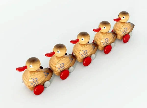 Uma Fileira Patos Brinquedo Madeira Com Rodas Organizadas Com Marcas — Fotografia de Stock