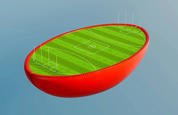 オーストラリアのルールボールが半分に分割され 日中のゴールでマークされた緑の草のサッカーのピッチが明らかになります 3Dレンダリング — ストック写真