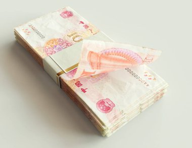 Bir tomar Çin Yuan banknotları izole ışık arka planı - 3D görüntüleme