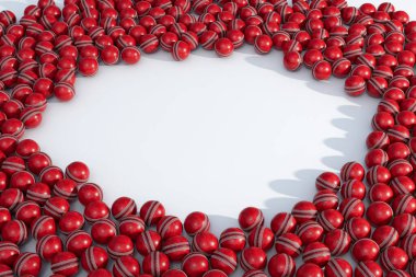 Rastgele aralıklı kırmızı, genel kriket toplarından oluşan geniş bir dizi merkezde net bir dairesel alan oluşturur.