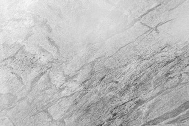 Çatı katı tarzı alçı duvarlar, gri, beyaz, duvar kağıdı olarak kullanılan boş alan. Ev tasarımında ve iç tasarımında popülerdir. Kopya boşluklarıyla.