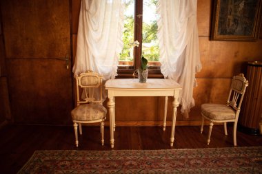 A beautiful, historic furniture in interior. Old room with furniture.