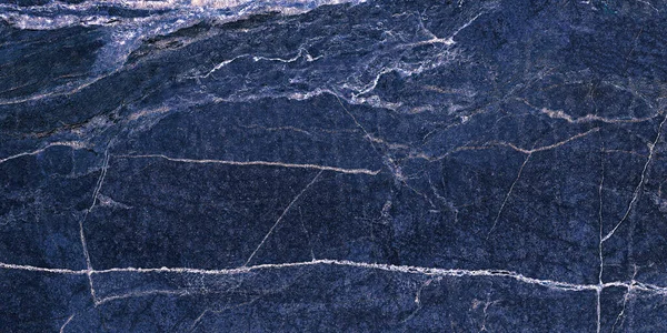 Blue Marble texture background floor decorative stone interior. natural pattern of marble background, Surface rock stone with a pattern of Emperador marble, Close up of blue abstract texture.