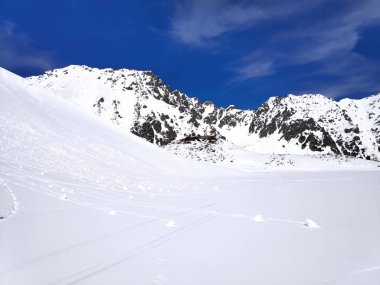 Beautiful panorama in winter Tatry mountains, Five Lakes Valley, Dolina Pieciu Stawow with snow. Phone photo