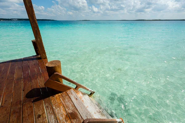 Beautiful landscape - wooden pier in Laguna Bacalar in Mexico during kayak trip.
