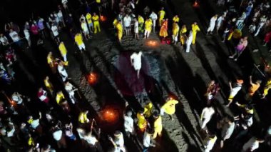 Kulim, Kedah, Malaysia - Oct 03 2022: Aerial top view Devotees fire walking celebrate Nine Emperor Gods Festival