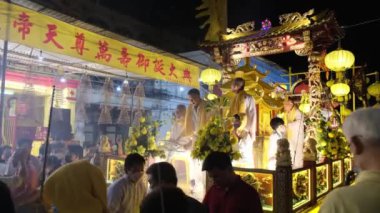 Georgetown, Penang, Malaysia - Oct 04 2022: Chinese devotees parade with Nine Emperor God during last day at at Jalan Cheong Fatt Sze or Hong kong Lane