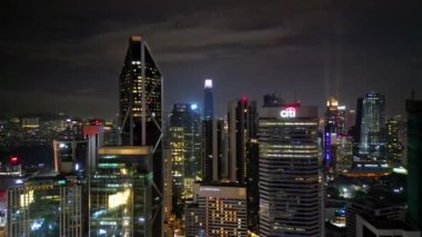 Bukit Bintang, Kuala Lumpur, Malaysia - Dec 04 2022: Aerial move over business building near Jalan Ampang in night