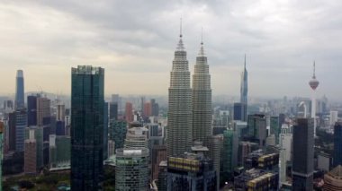 Bukit Bintang, Kuala Lumpur, Malaysia - Dec 25 2022: Aerial ascending and view the skyscraper building of KL