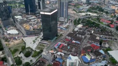 Bukit Bintang, Kuala Lumpur, Malaysia - Dec 26 2022: Aerial view TRX business park and old shophouse