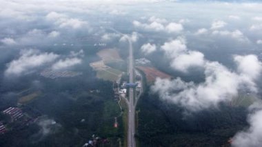 Aerial top down view white cloud at Butterworth Kulim Express BKE toll