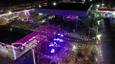 Sungai Nibong, Penang, Malaysia - Dec 16 2022: Aerial view people visit to the show Pesta Pulau Pinang in night