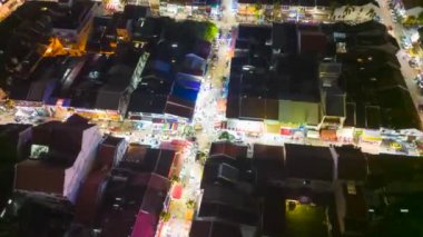 Sungai Nibong, Penang, Malaysia - Oct 24 2022: Aerial hyperlapse surround busy cross road at Little India Street