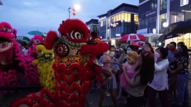 Seberang Perai, Penang, Malaysia - Jan 27 2023: Public enjoy the show of lion dance at street