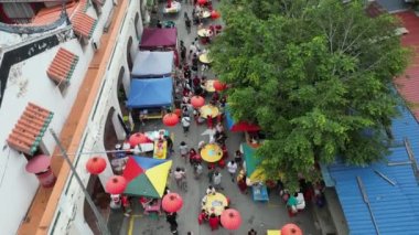 Georgetown, Penang, Malaysia - Jan 28 2023: Aerial view hawker food sell at street during celebration Chinese New Year