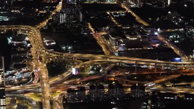 Bukit Bintang, Kuala Lumpur, Malaysia - Dec 13 2024: Aerial city at night with effect car light trail