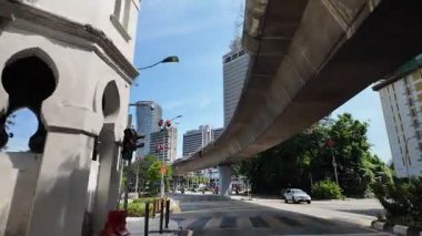 Bukit Bintang, Kuala Lumpur, Malaysia - Jun 15 2024: A street with a building in the background.