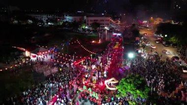 Bukit Mertajam, Penang, Malaysia - Feb 17 2024: With rhythmic drums, the dragon dance and fireworks honors the Jade Emperor's sacred day.