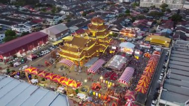 Raja Uda, Penang, Malaysia - Feb 23 2024: A large crowd of people are gathered at Nine Emperor Gods Temple