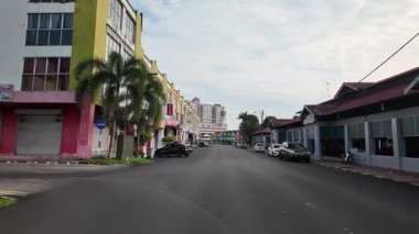 Kota Tinggi, Johor, Malaysia - May 29 2024: A street with a building. There are no people on the street