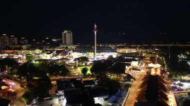 Bandar Hilir, Melaka, Malaysia - Jan 12 2024: Aerial night view of Minang Sari lit beautifully against the dark sky.