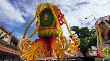 George Town, Penang, Malaysia - Jan 25 2024: Faithful participants endure physical trials during the Thaipusam kavadi ritual.