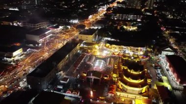 Raja Uda, Penang, Malaysia - Feb 23 2024: Spectacular fireworks celebration at Nine Emperor Gods Temple seen from above.