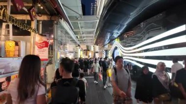 Bukit Bintang, Kuala Lumpur, Malaysia - Jun 15 2024: People are walking down a street